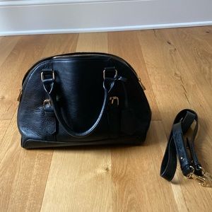 Ora Delphine black leather handbag.